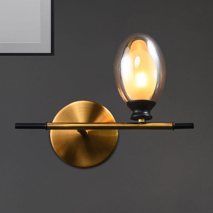 Lisslune | Clear/Amber Glass Egg Shape Wall Light Minimalist 1 Light Brass Wall Lamp with Horizontal Arm