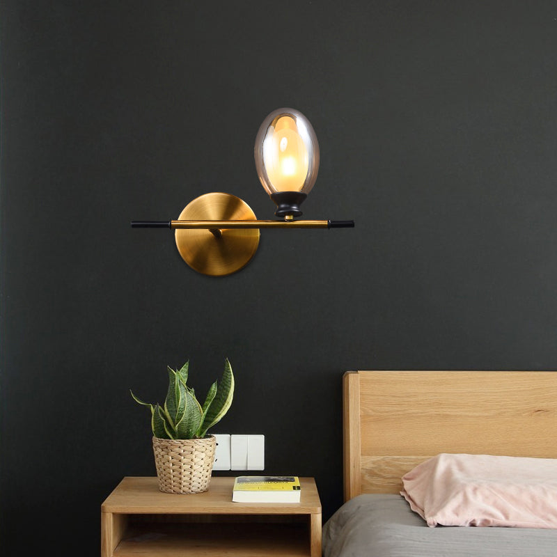 Lisslune | Clear/Amber Glass Egg Shape Wall Light Minimalist 1 Light Brass Wall Lamp with Horizontal Arm