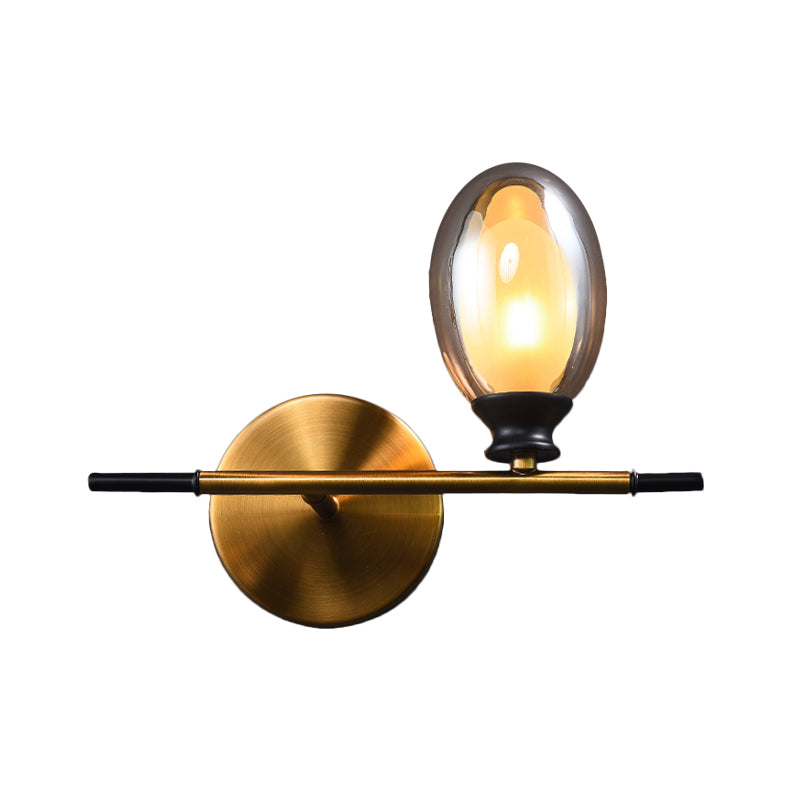 Lisslune | Clear/Amber Glass Egg Shape Wall Light Minimalist 1 Light Brass Wall Lamp with Horizontal Arm