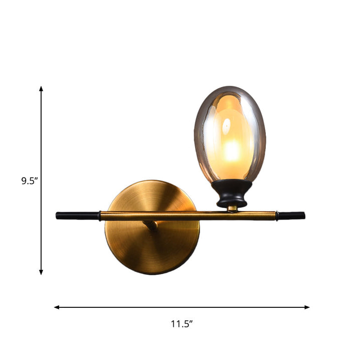 Lisslune | Clear/Amber Glass Egg Shape Wall Light Minimalist 1 Light Brass Wall Lamp with Horizontal Arm