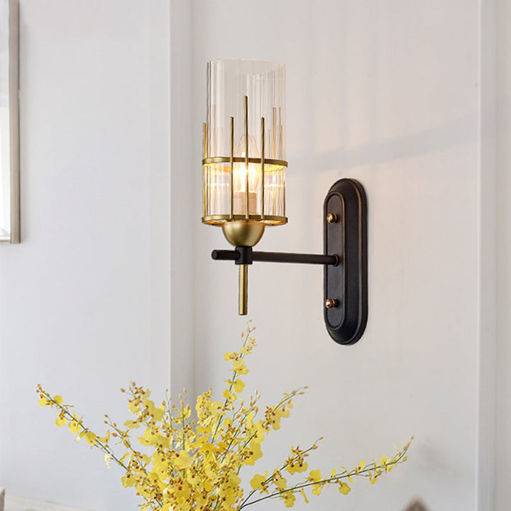 Skørter | 1 Light Wall Sconce Traditional Living Room Wall Lighting Fixture with Cylindrical Clear Glass Shade in Gold