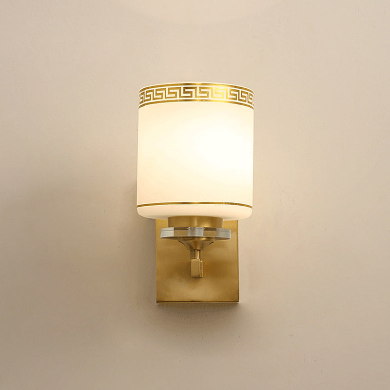 Skørter | Single Cylinder Wall Lamp Traditional Opal Frosted Glass Wall Light in Gold with Swastika Element