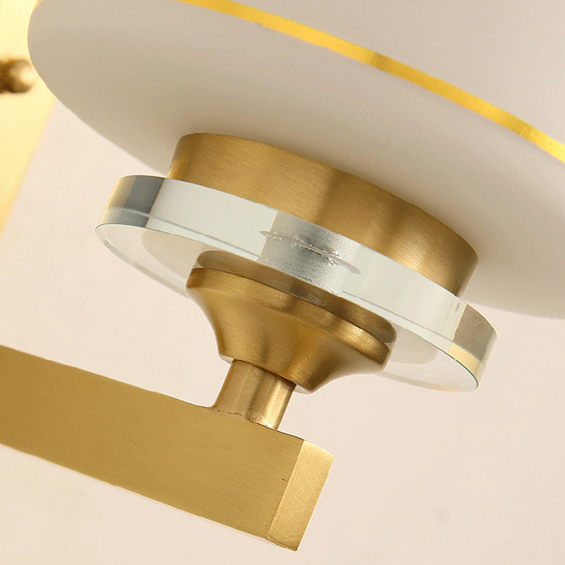 Skørter | Single Cylinder Wall Lamp Traditional Opal Frosted Glass Wall Light in Gold with Swastika Element