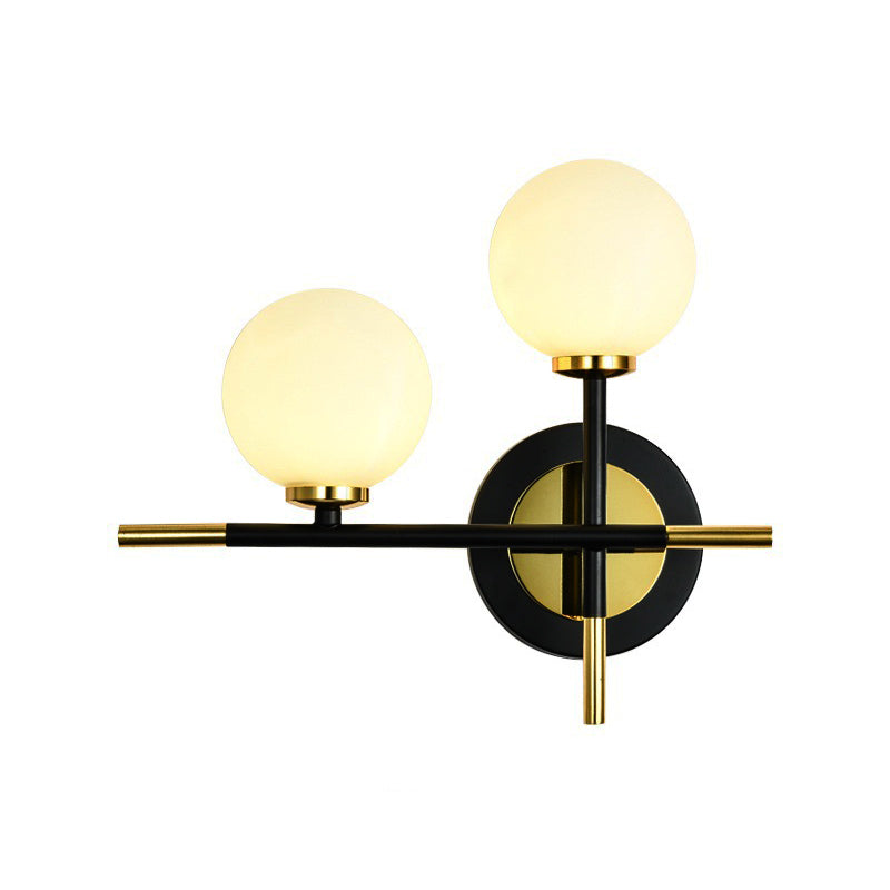 Lisslune | Milk glass orb wall light with cross design 2 lights modern black and brass wall light