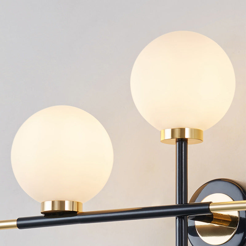 Lisslune | Milk glass orb wall light with cross design 2 lights modern black and brass wall light