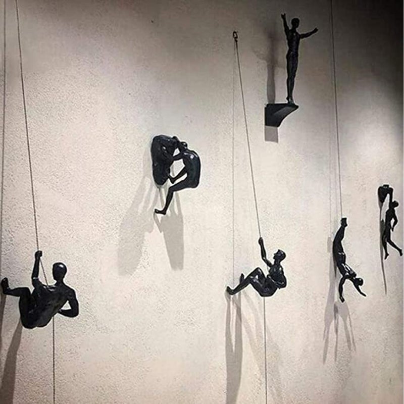 Lisslune | Climbing wall hanging statues