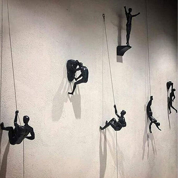Lisslune | Climbing wall hanging statues
