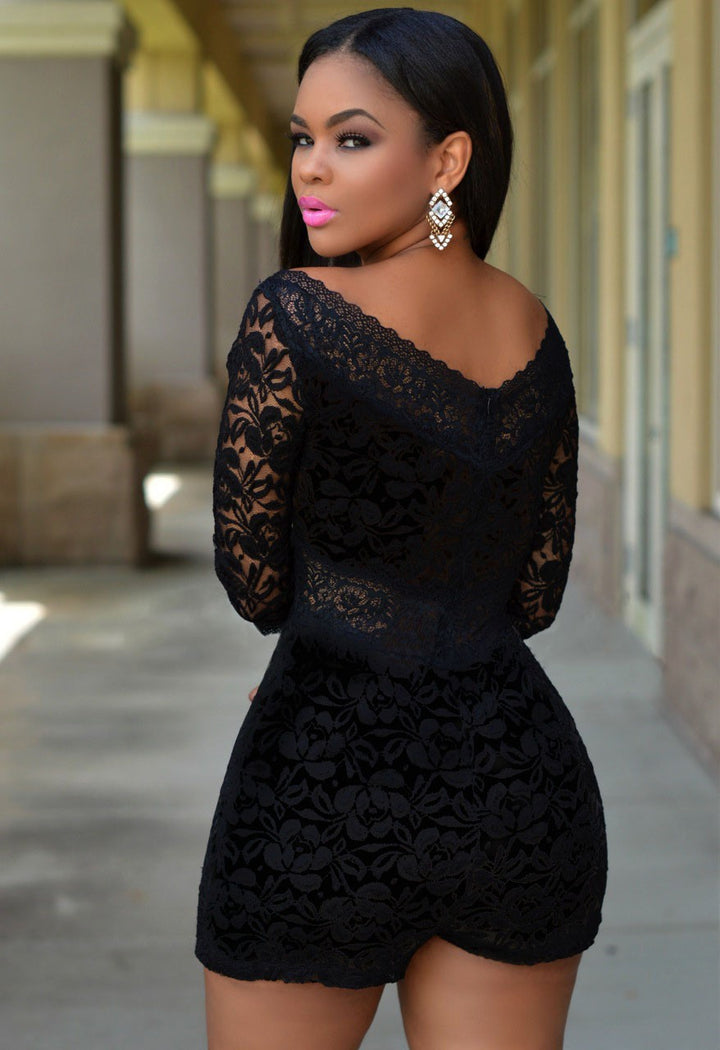 Ladies lace playsuit with off-shoulder design and elegant cut details