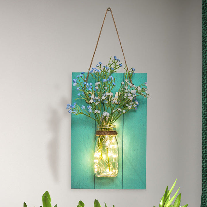 Skørter | Flower light string with blue wooden back panel modern glass container wall lamp for café restaurant