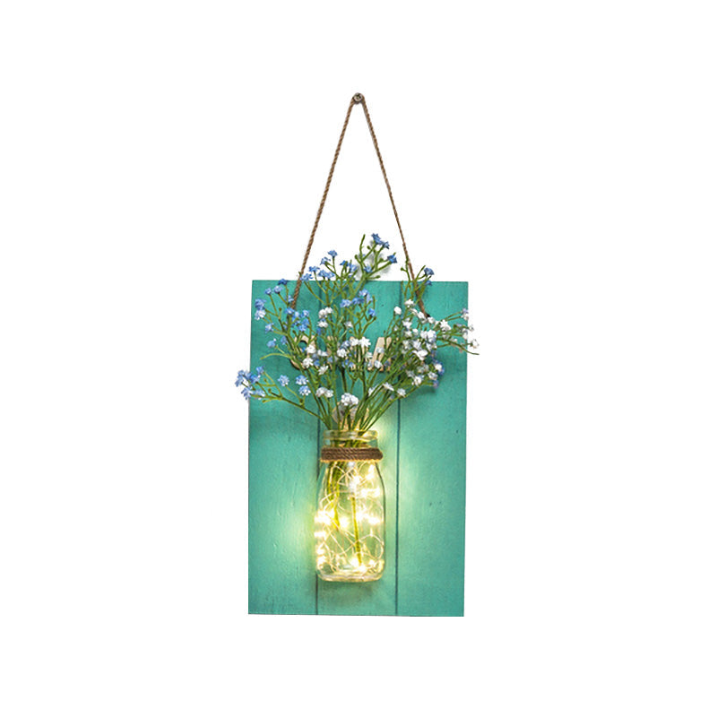 Skørter | Flower light string with blue wooden back panel modern glass container wall lamp for café restaurant