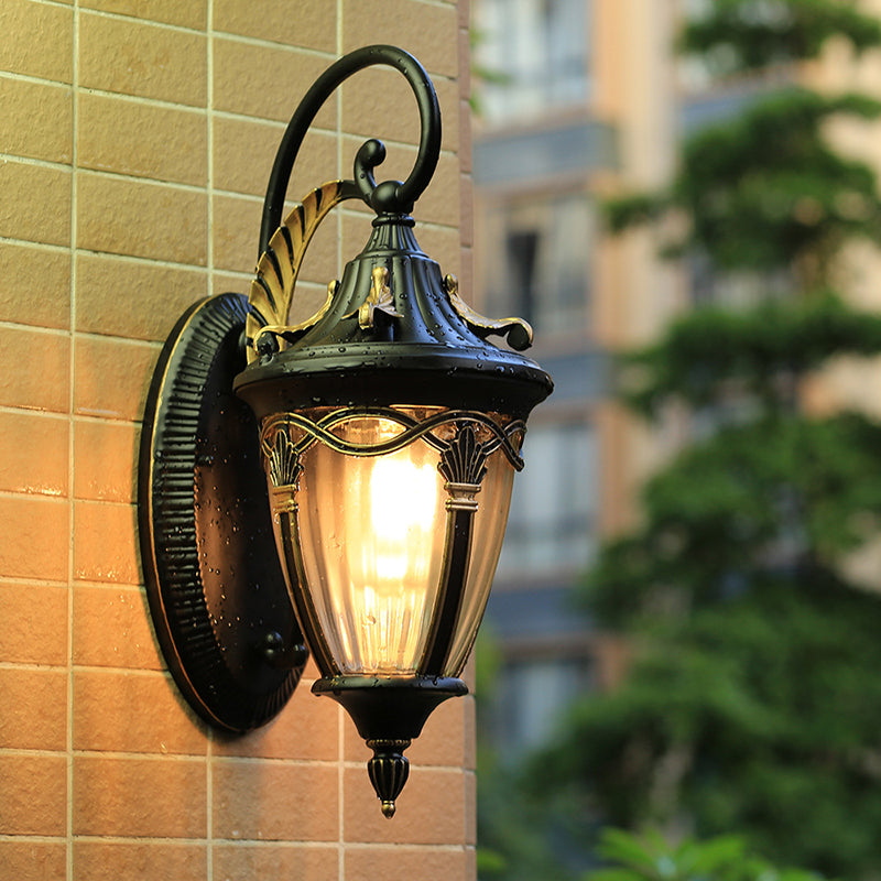 Skørter | Brass/black pinecone wall lamp farmhouse clear ribbed glass 1 bulb outdoor wall light