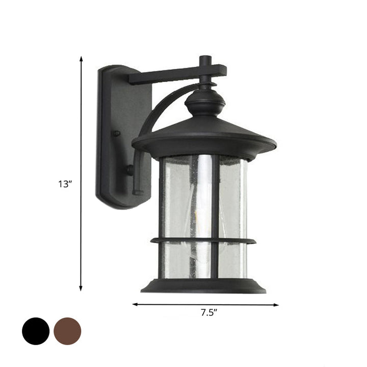 Skørter | Clear Seeded Glass Cylinder Wall Lamp Lodges 1-Bulb Outdoor Wall Mounted Lamp in Black/Brown for Garden