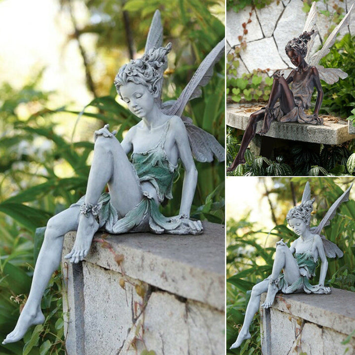 Lisslune | Statue of sitting fairy in the garden