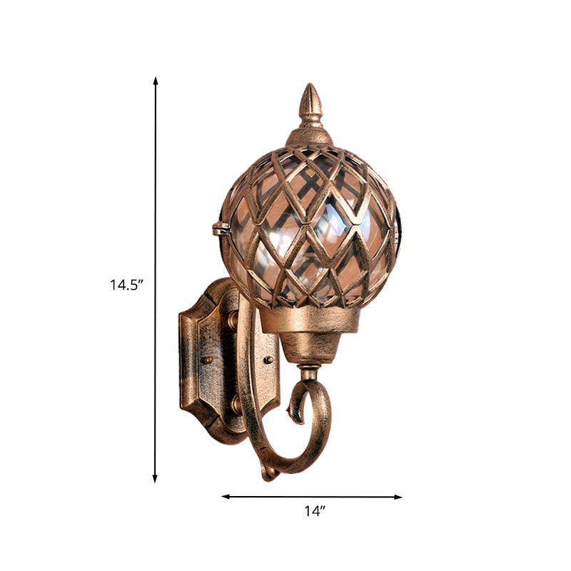 Skørter | Clear Glass Globe Wall Light Lodges 1-Bulb Outdoor Wall Light in Brass with Cage