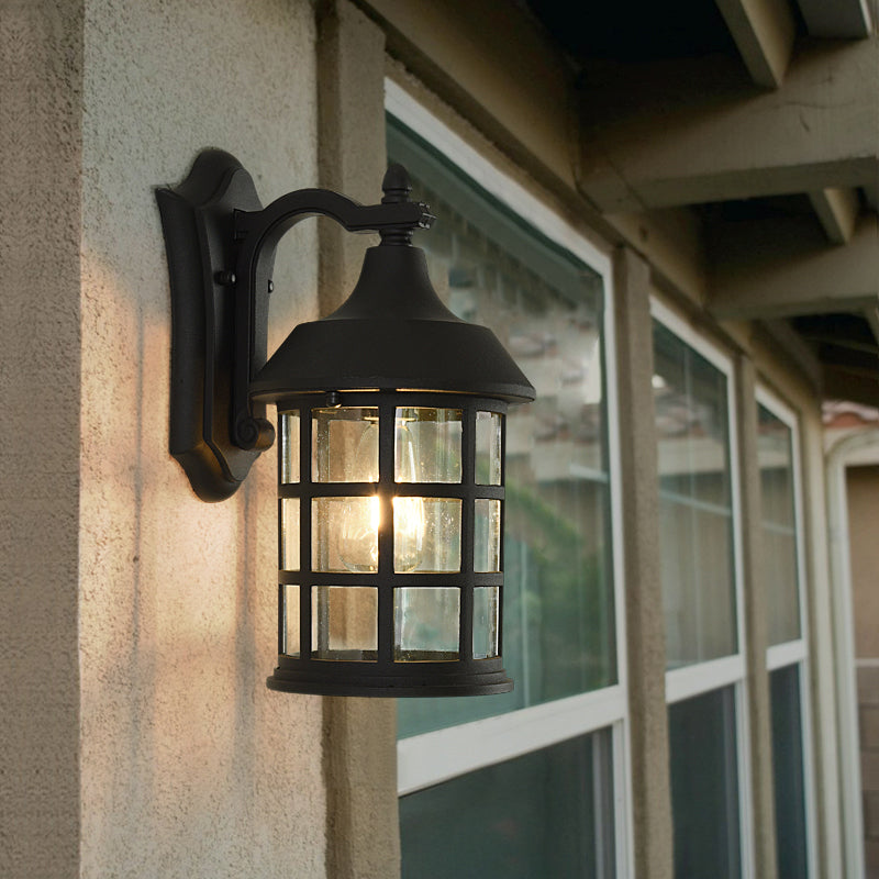 Skørter | Birdcage clear glass wall lamp country single balls courtyard wall lamp in black with metal frame