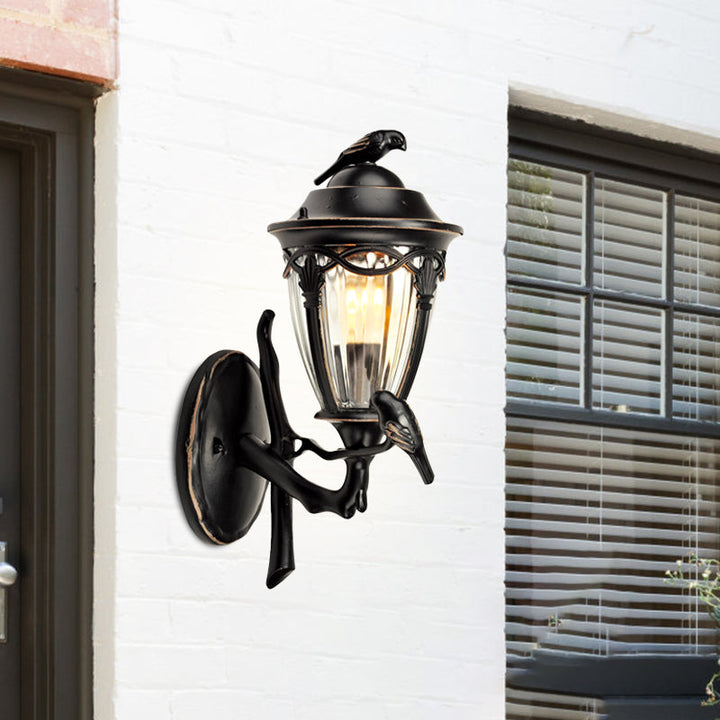 Skørter | Clear glass urn wall lamp Countryside 1 light Patio wall lighting in black with bird decor