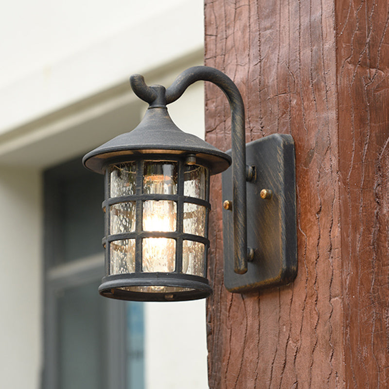 Skørter | sown glass lantern wall lamp rustic single light outdoor wall lamp in bronze/black