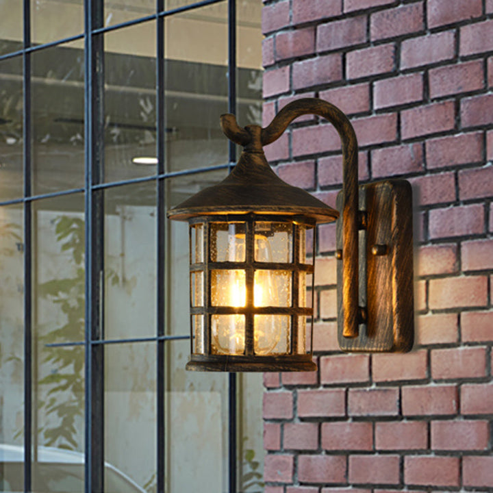 Skørter | sown glass lantern wall lamp rustic single light outdoor wall lamp in bronze/black