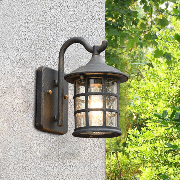 Skørter | sown glass lantern wall lamp rustic single light outdoor wall lamp in bronze/black