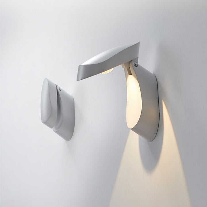 Lisslune | Rotatable oval surface wall lamp Modern metal LED bedside wall lamp in white/black/gold finish