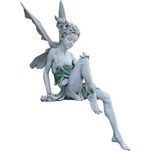 Lisslune | Statue of sitting fairy in the garden