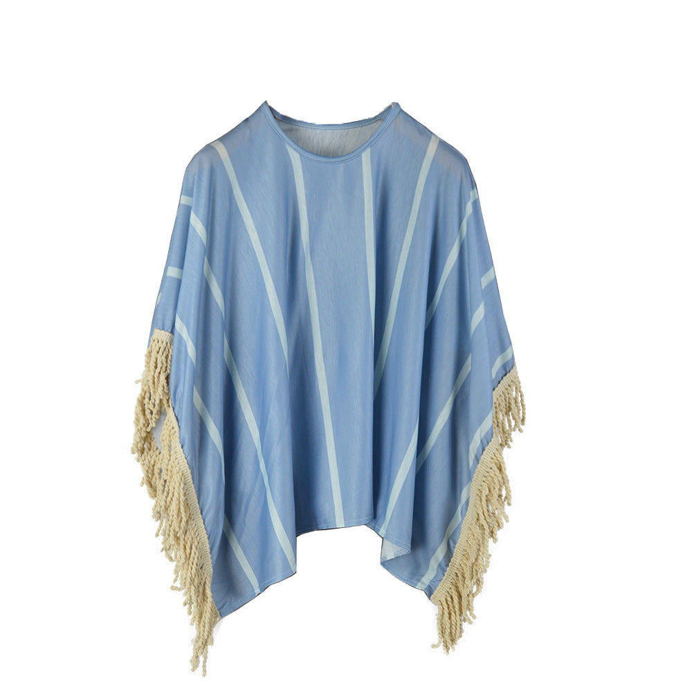 Women's beach poncho with fringed hem and striped design