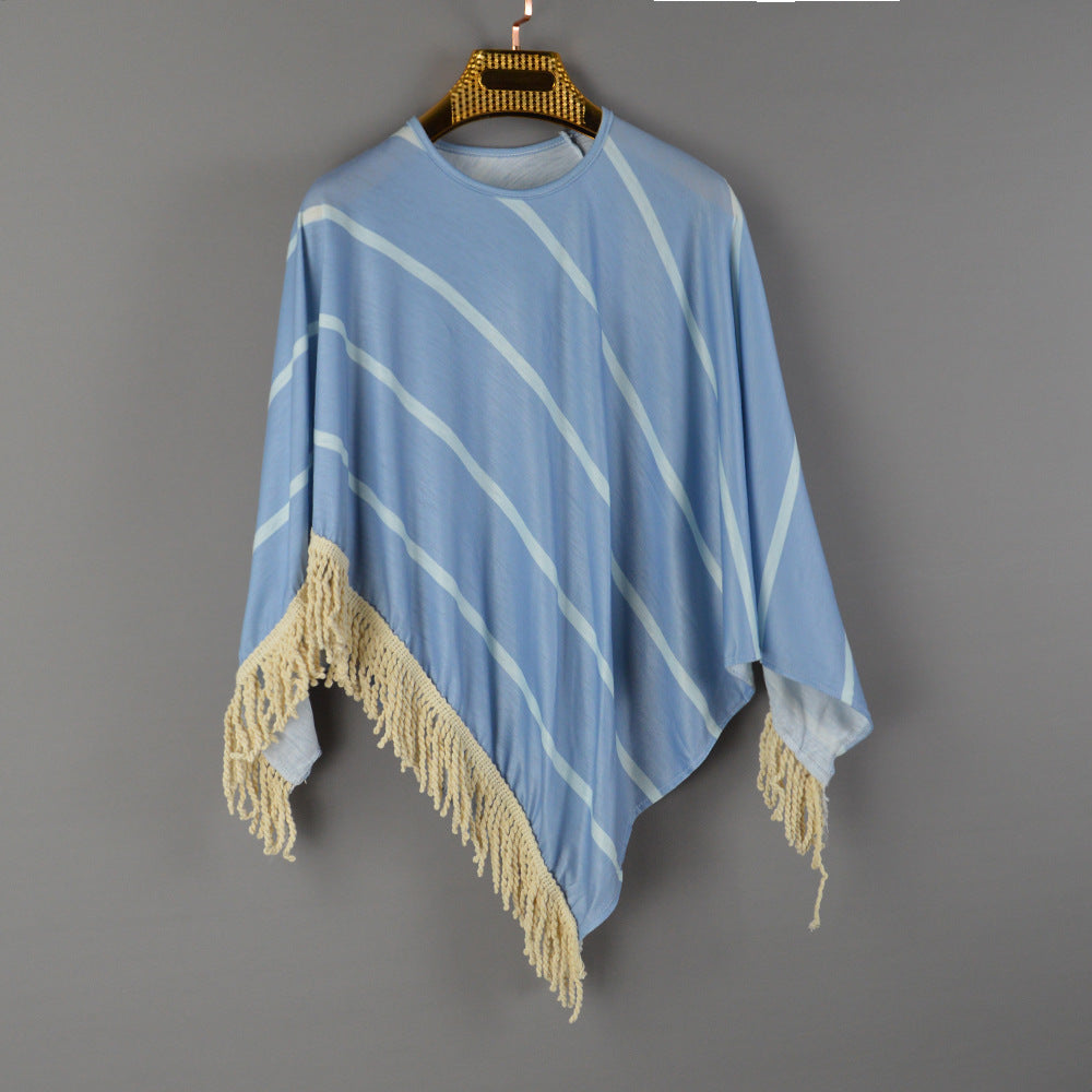 Women's beach poncho with fringed hem and striped design