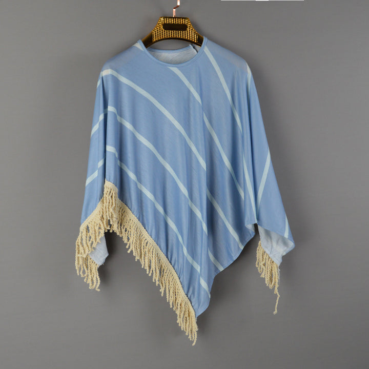 Women's beach poncho with fringed hem and striped design