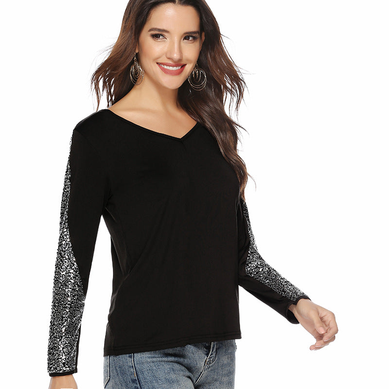 Women's elegant top with glittering sleeves and V-neck