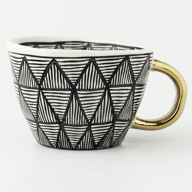 Lisslune | Cup with abstract geometric pattern and gold handle