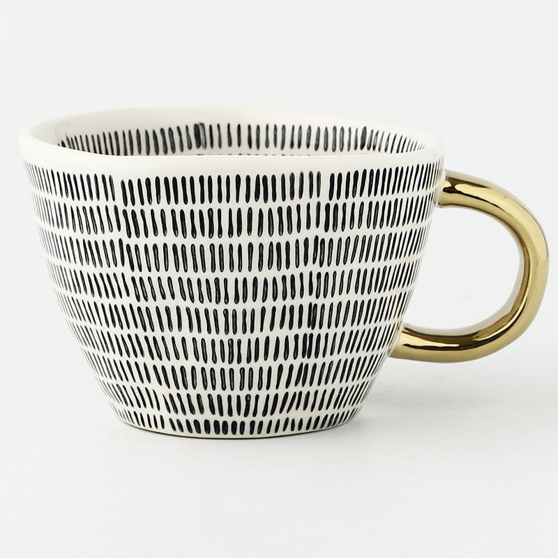 Lisslune | Cup with abstract geometric pattern and gold handle