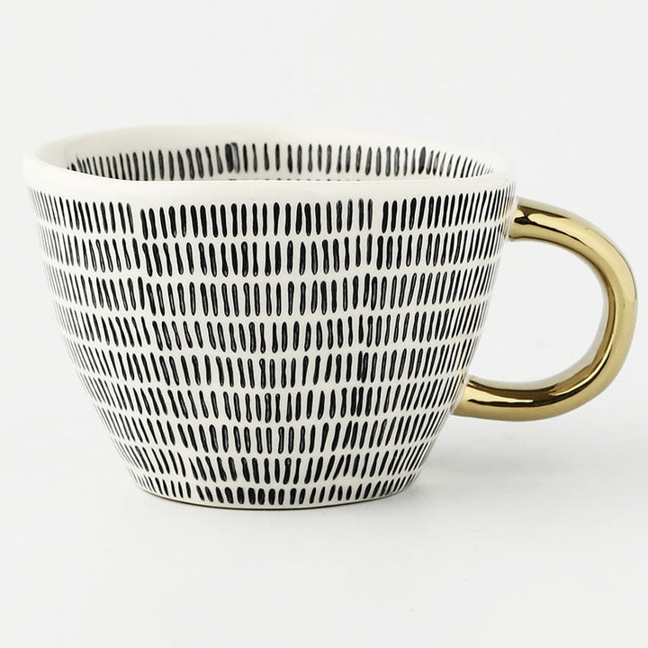 Lisslune | Cup with abstract geometric pattern and gold handle