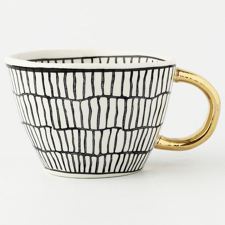 Lisslune | Cup with abstract geometric pattern and gold handle
