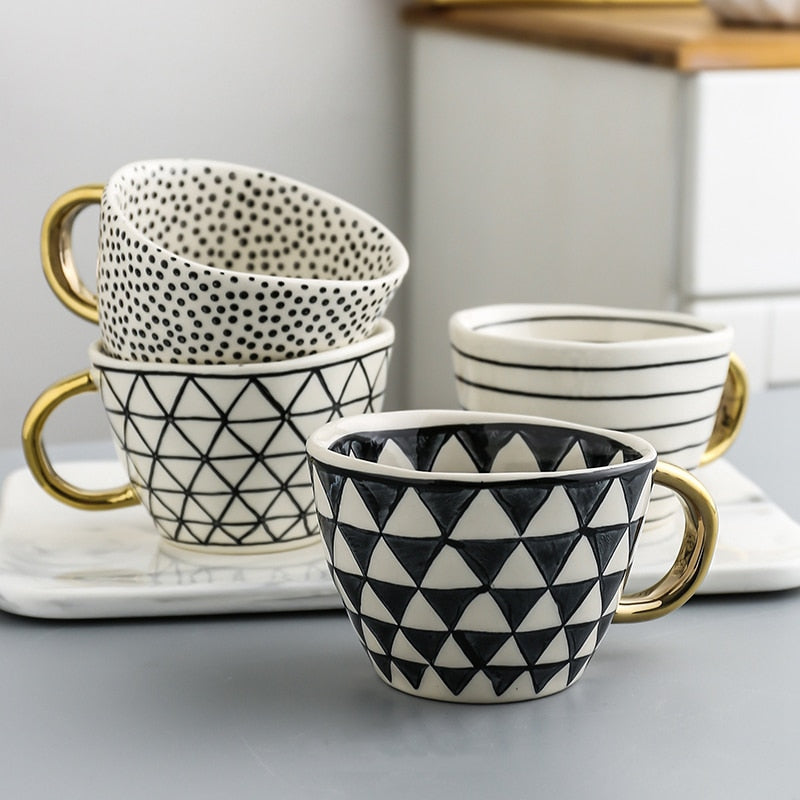 Lisslune | Cup with abstract geometric pattern and gold handle