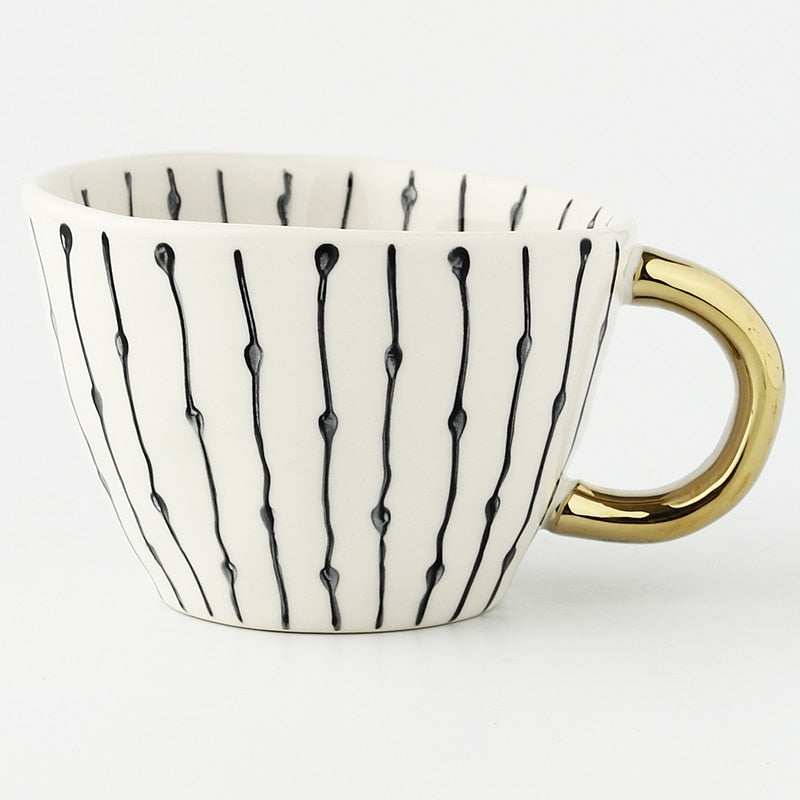 Lisslune | Cup with abstract geometric pattern and gold handle