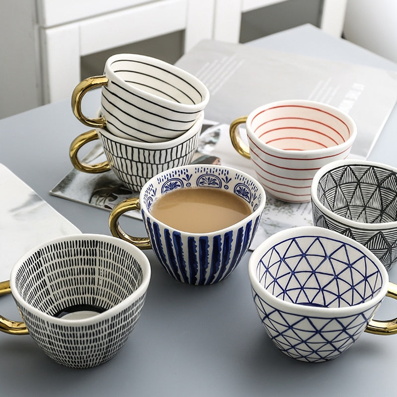 Lisslune | Cup with abstract geometric pattern and gold handle