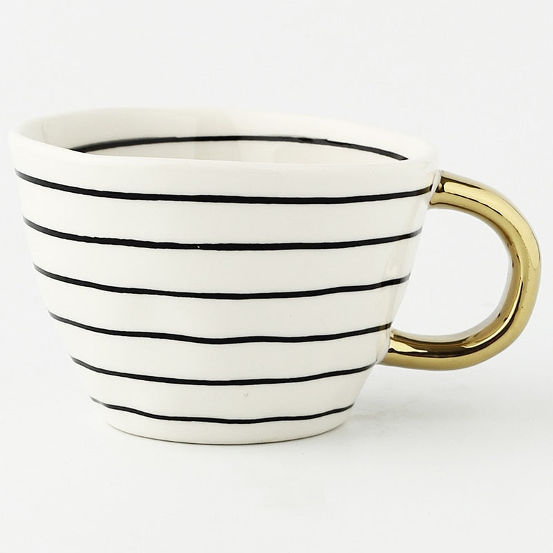 Lisslune | Cup with abstract geometric pattern and gold handle