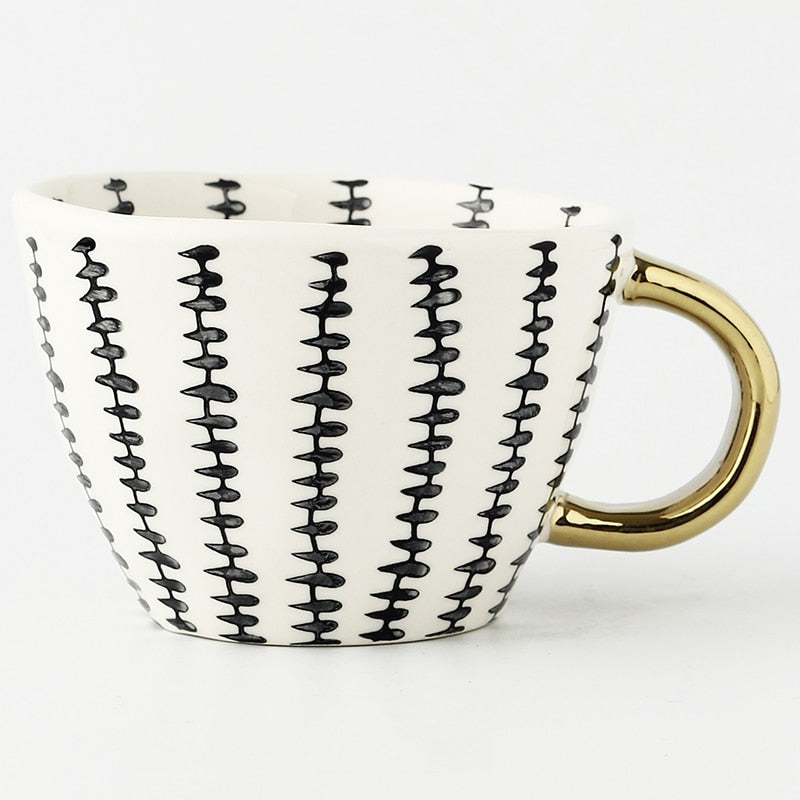 Lisslune | Cup with abstract geometric pattern and gold handle