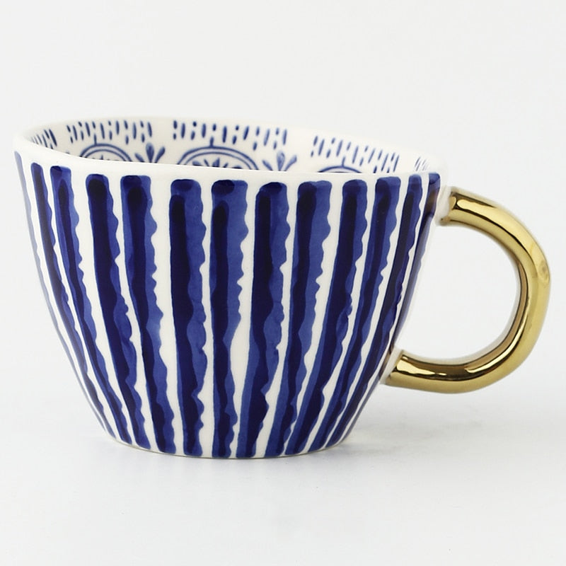 Lisslune | Cup with abstract geometric pattern and gold handle