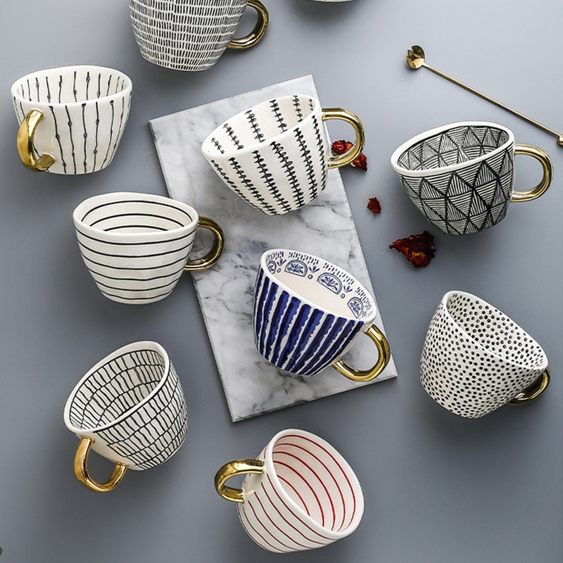 Lisslune | Cup with abstract geometric pattern and gold handle