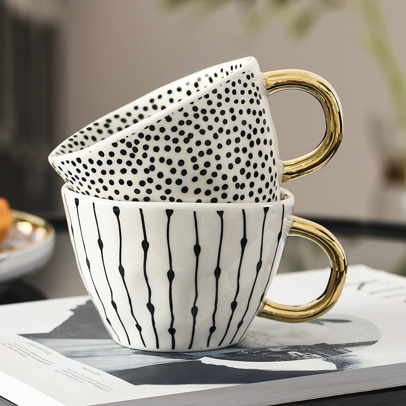 Lisslune | Cup with abstract geometric pattern and gold handle