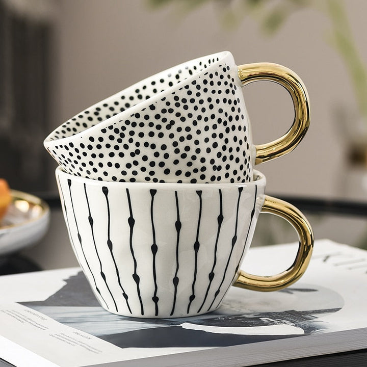 Lisslune | Cup with abstract geometric pattern and gold handle