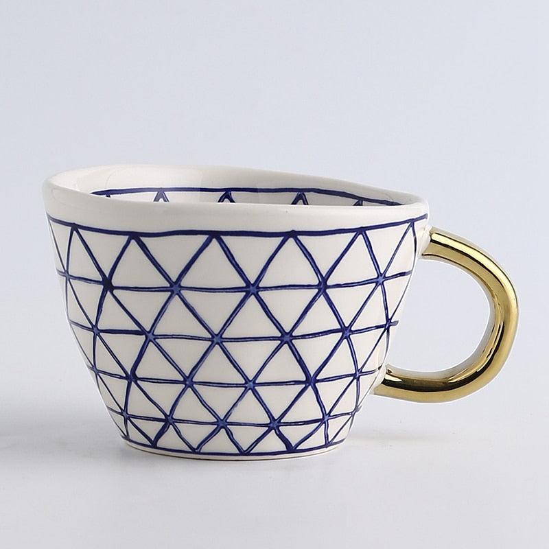 Lisslune | Cup with abstract geometric pattern and gold handle
