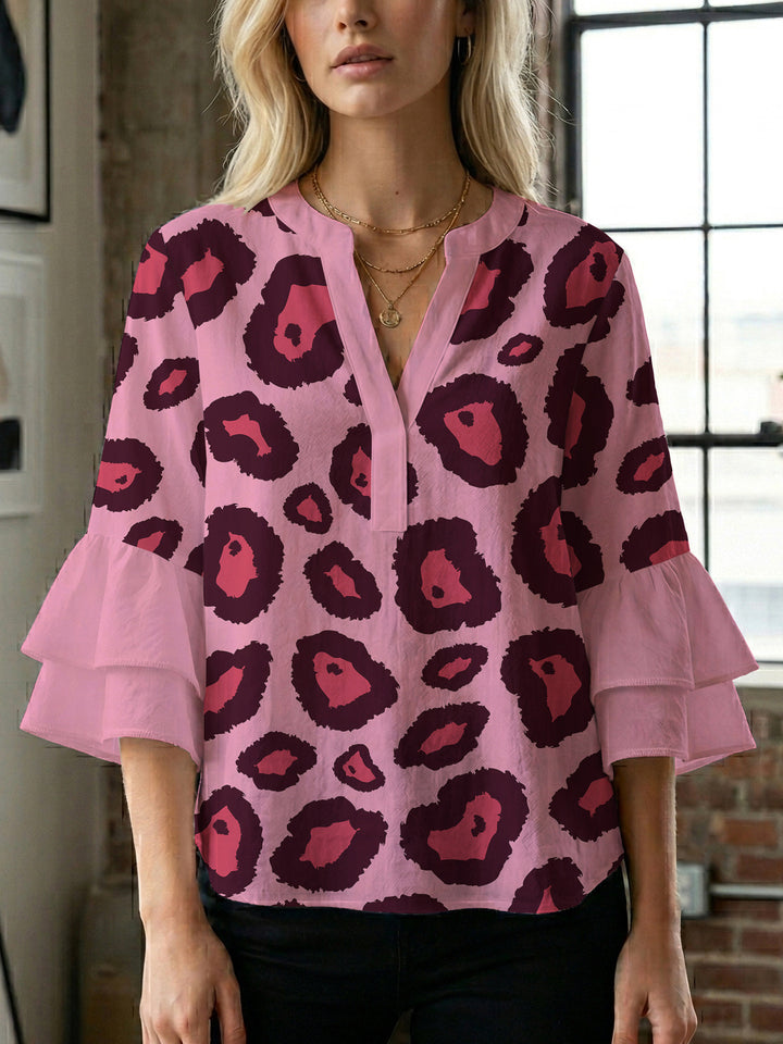 Women's blouse with ruffle details and eye-catching animal print Lisslune