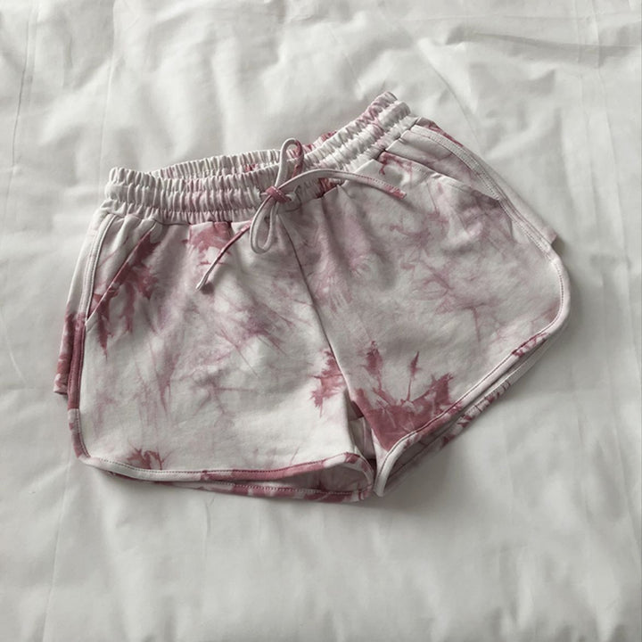 Women’s casual sweat shorts with trendy tie-dye design and practical side pockets