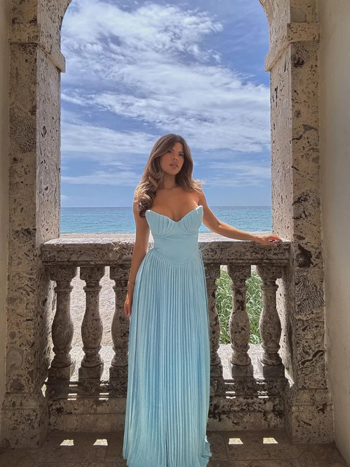 Women’s pleated dress with deep heart-shaped neckline and flowing skirt Lisslune