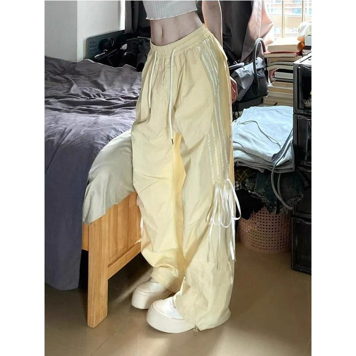 Women’s casual sports pants with side stripes and comfortable drawstring waistband