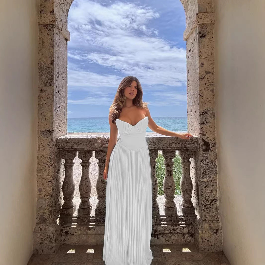 Women’s pleated dress with deep heart-shaped neckline and flowing skirt Lisslune
