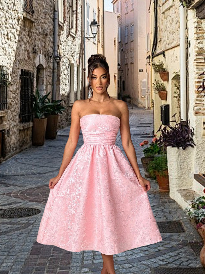 Ladies cocktail dress with elegant bustier top and flared skirt
