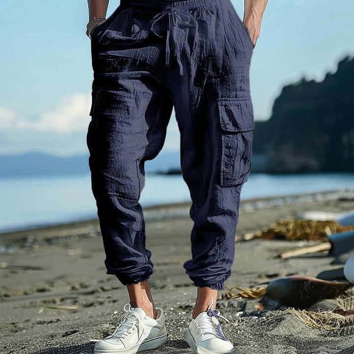Men's comfortable cargo pants made of lightweight linen material with elastic waistband and practical side pockets Lisslune